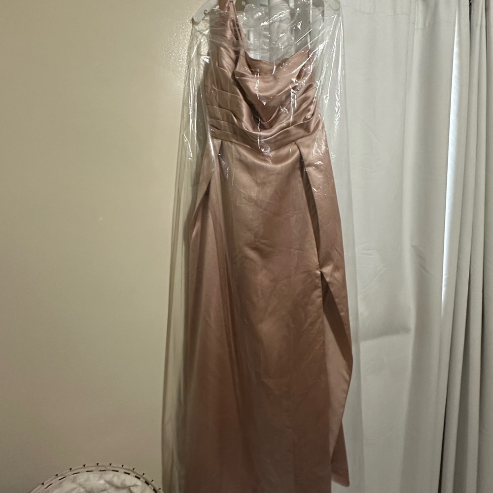 Bridesmaid. Size 18. Unaltered. Has original length and width. Sand color.